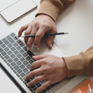 Person typing on the computer