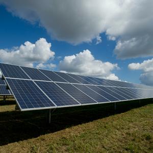Solar panels on green field