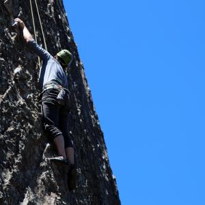 Climbing a rock face